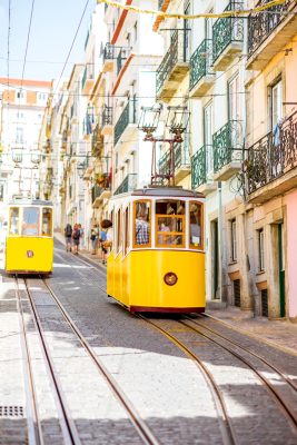 street view with famous yellow funicular tram lisbon sunny day portugal201 267x400 Viajeros singles